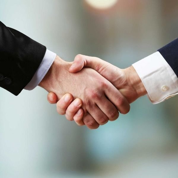 Handshake representing a trusted business partnership
